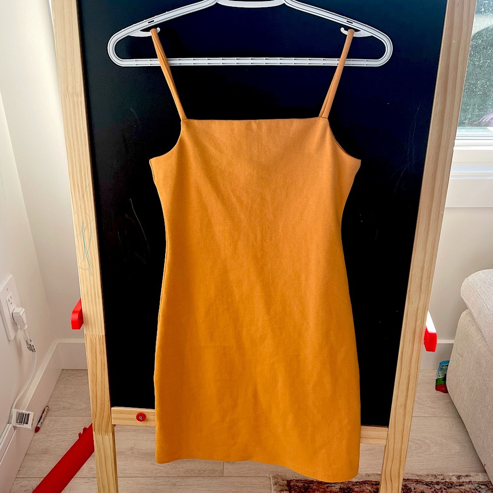 Cute mini bodycon dress in orange, from Oak+Fort size S
